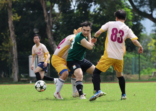 Players from both teams compete hard during the game.